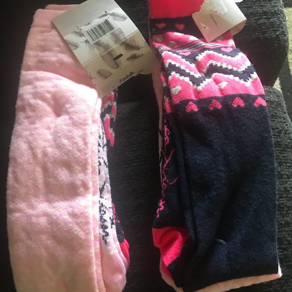 Multiple Jessica Simpson and DKNY socks,